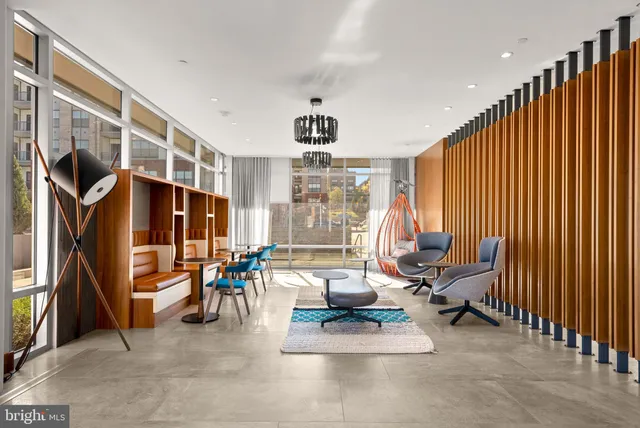 a view of a livingroom with couch and a window