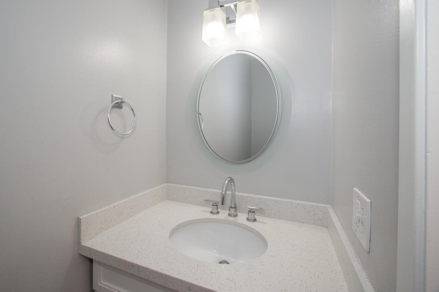 810 Juno Lane Foster City, CA 94404 - Photo 16 of 43 a bathroom with a sink and a mirror