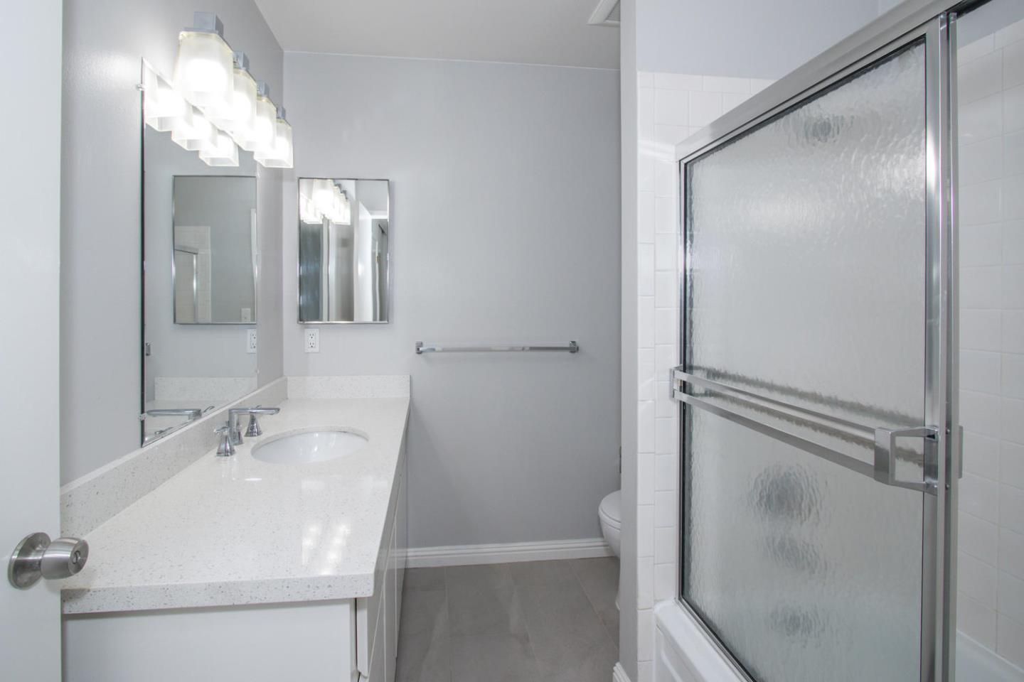810 Juno Lane Foster City, CA 94404 - Photo 22 of 43 a bathroom with a sink and mirror