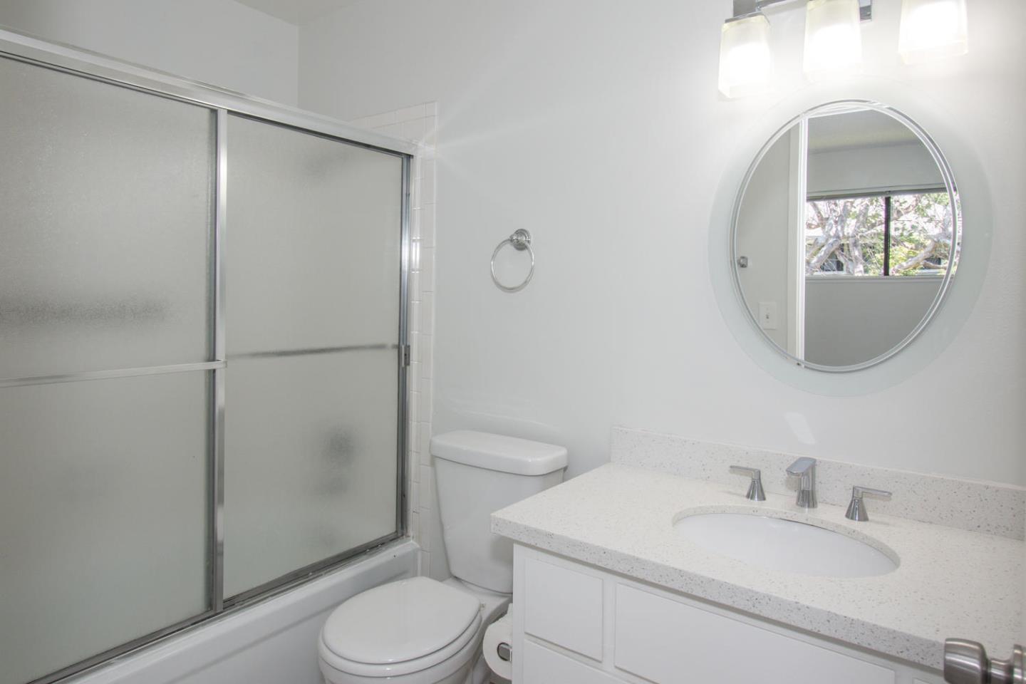810 Juno Lane Foster City, CA 94404 - Photo 28 of 43 a bathroom with a toilet a sink and a mirror