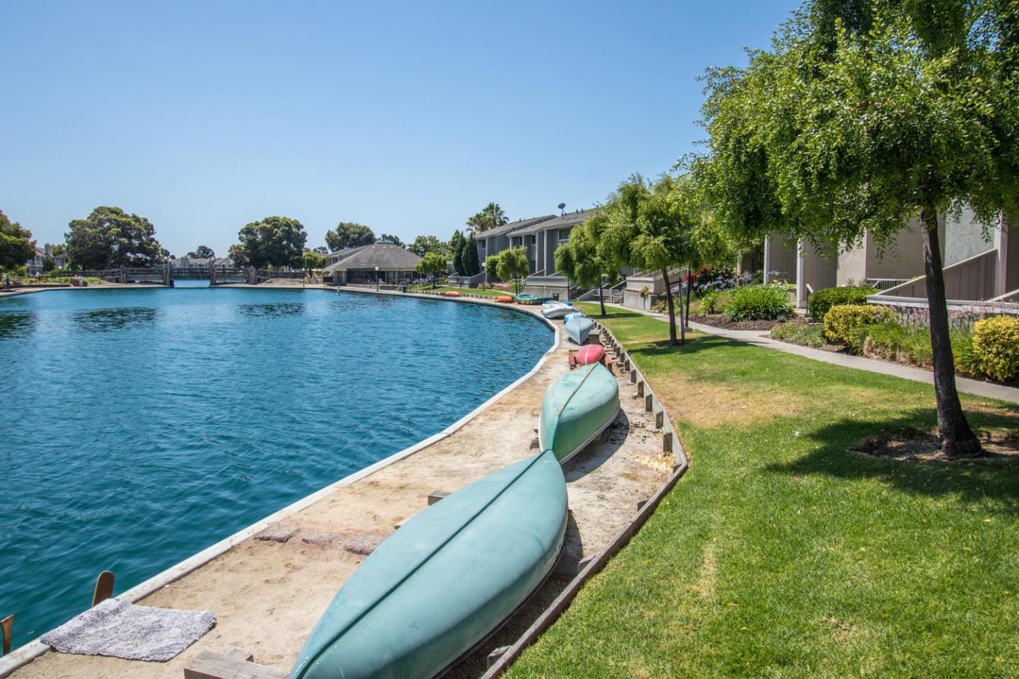 810 Juno Lane Foster City, CA 94404 - Photo 39 of 43 a view of a lake with a yard
