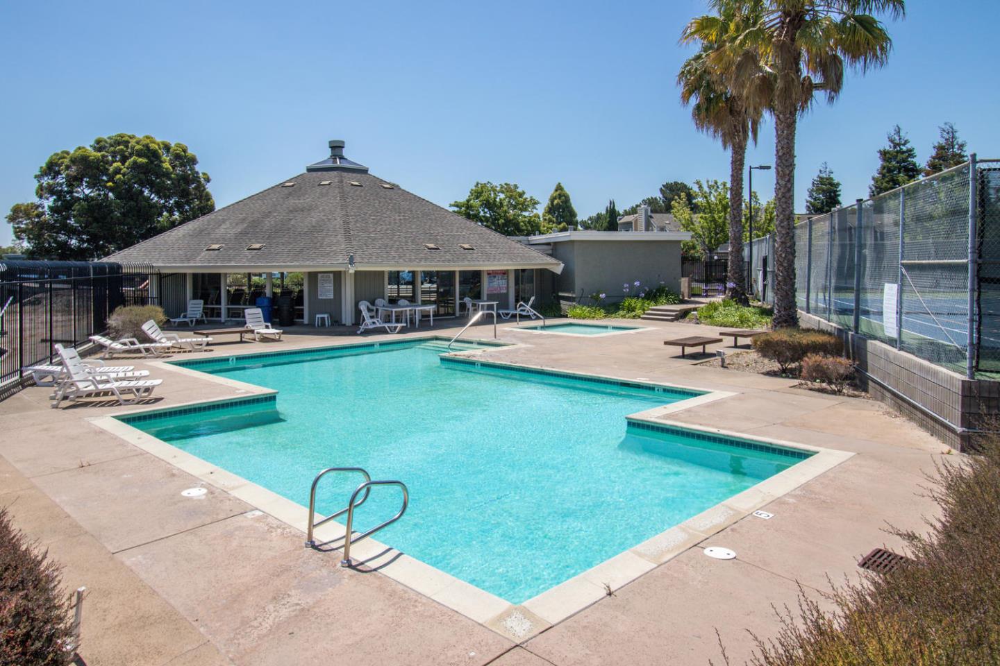 810 Juno Lane Foster City, CA 94404 - Photo 41 of 43 a swimming pool with outdoor seating and yard