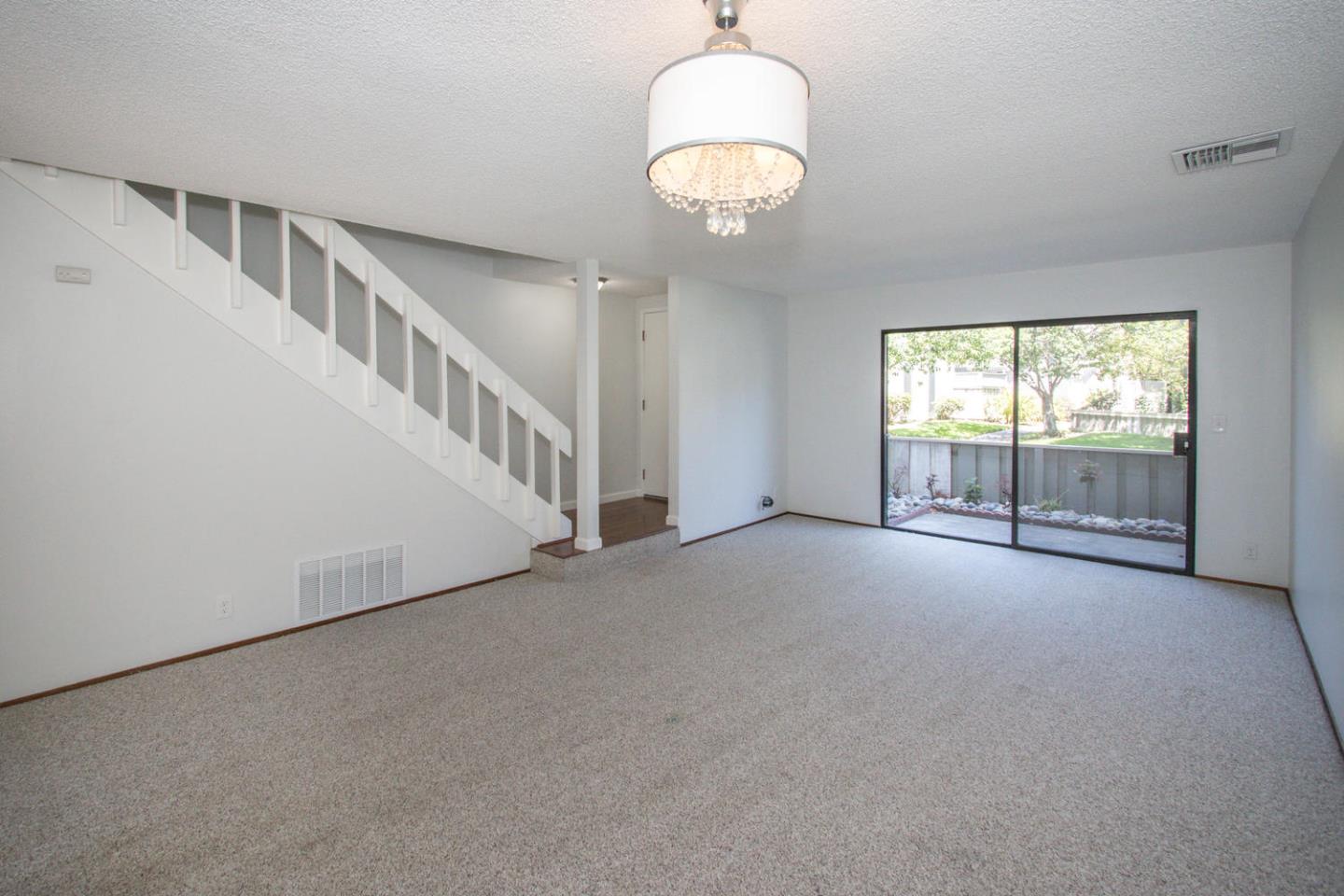 810 Juno Lane Foster City, CA 94404 - Photo 6 of 43 a view of an empty room with a window