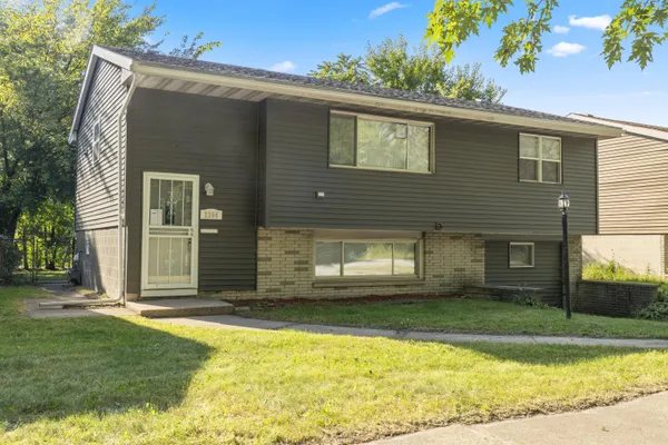 a view of a house with a swimming pool
