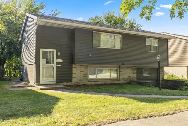 a view of a house with a swimming pool