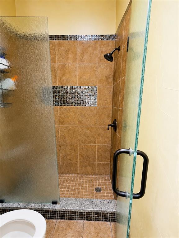 6004 Ridgemore Drive Parker, TX 75002 - Photo 2 of 13 a bathroom with a shower