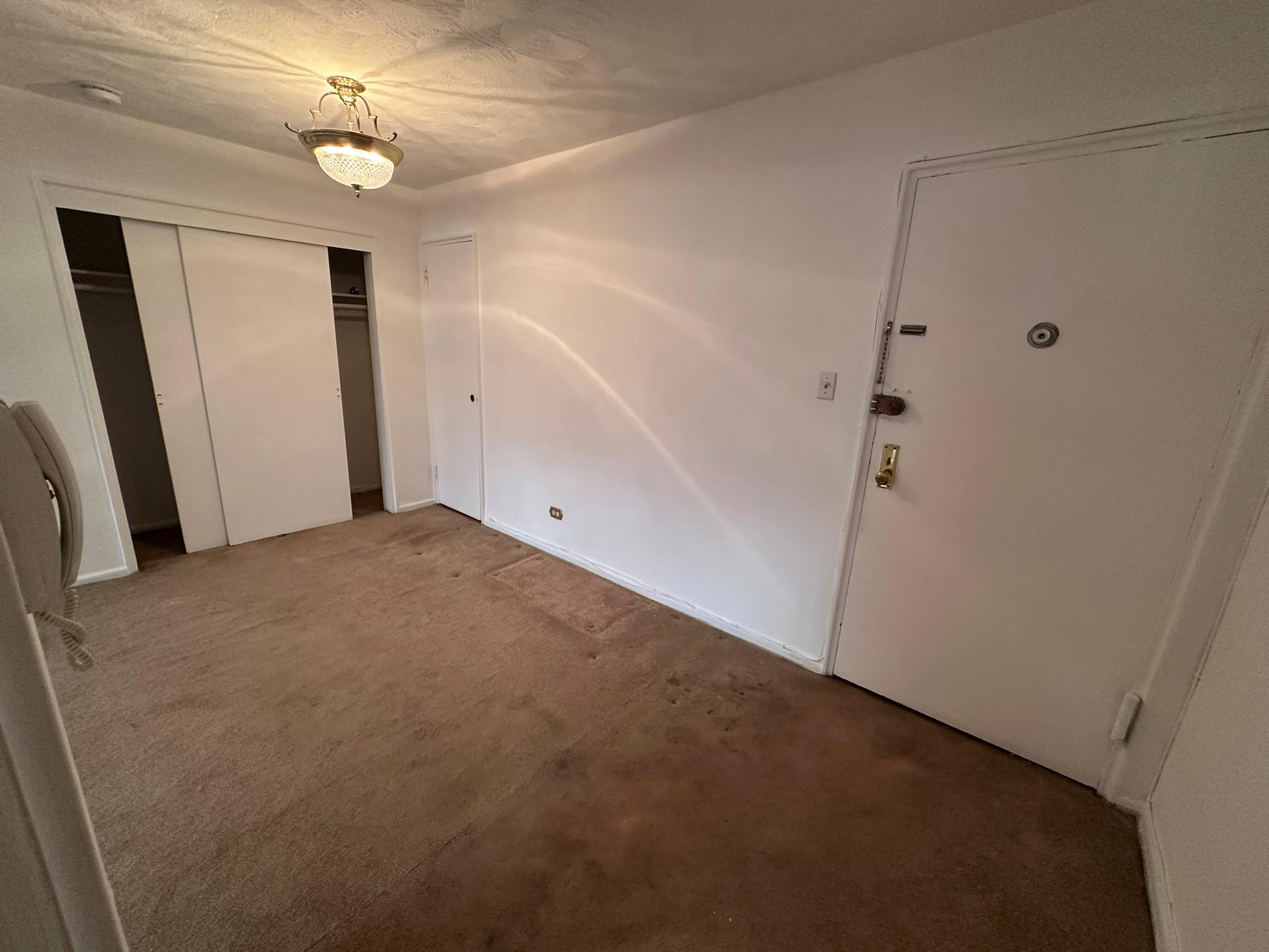 209-25 18th Avenue, Unit 1C Queens, NY 11360 - Photo 9 of 26 a view of a room with an empty space
