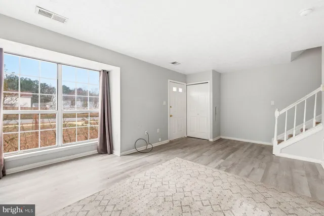 an empty room with windows