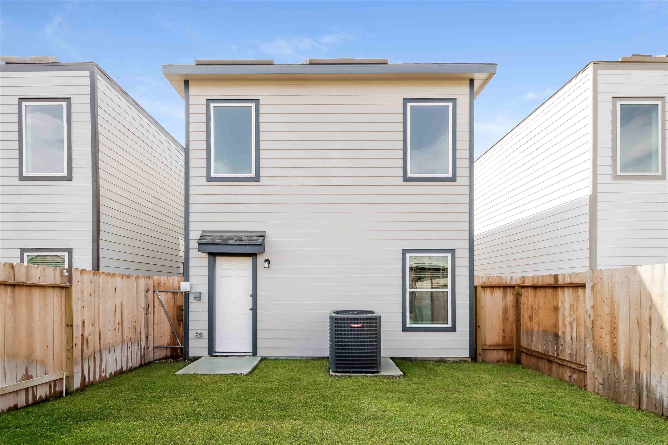 15316 Estrella Road East Houston, TX 77073 - Photo 2 of 15 a view of backyard with barbeque grill and wooden fence