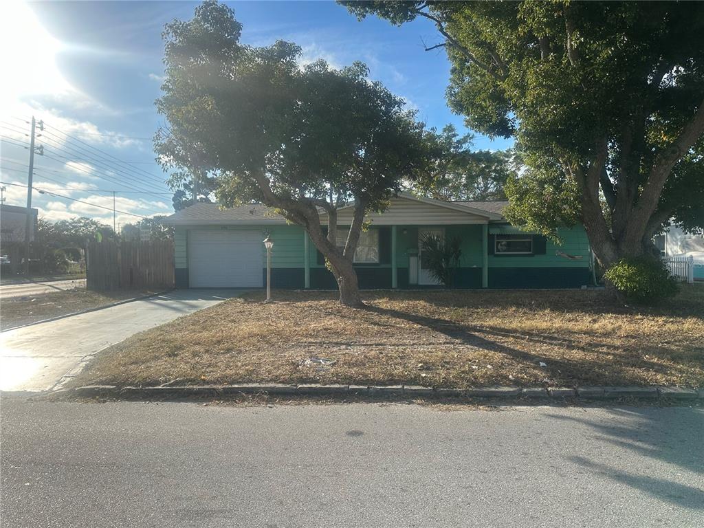 a house with trees in front of it