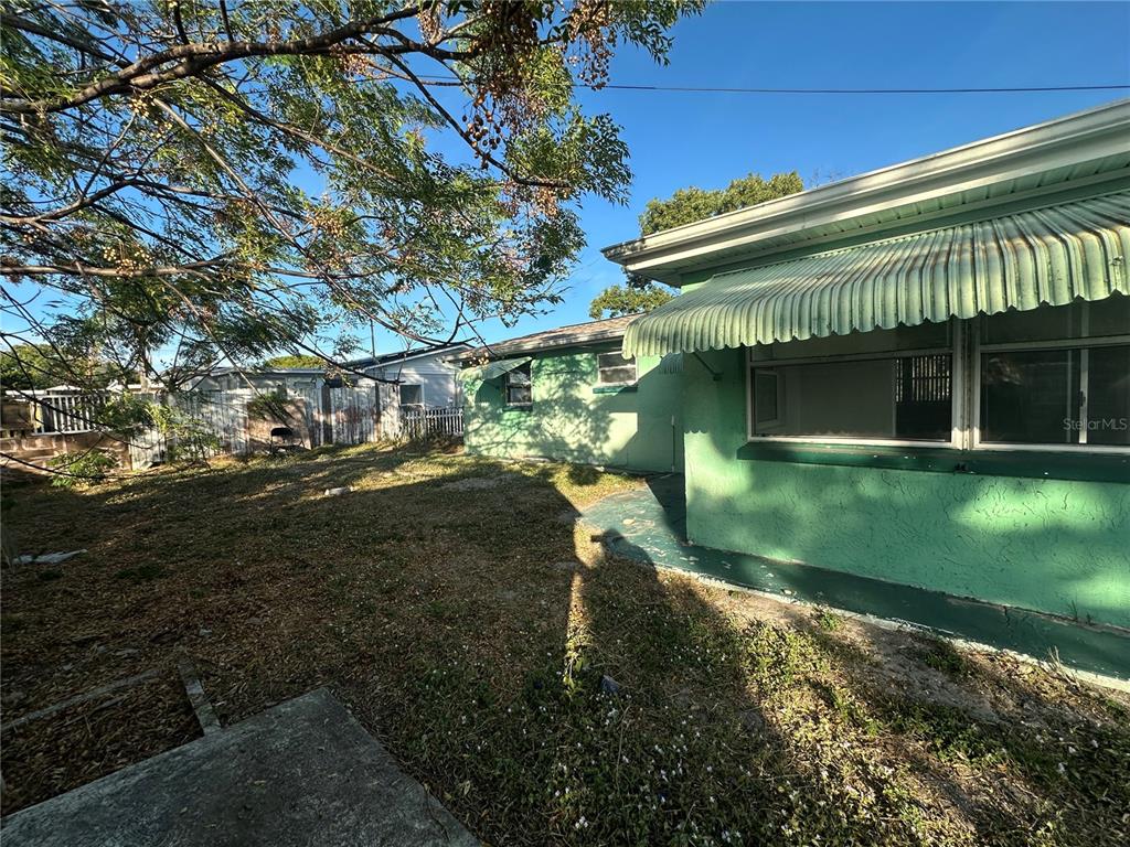 3505 Latimer Street New Port Richey, FL 34652 - Photo 17 of 20 a view of a house with a yard