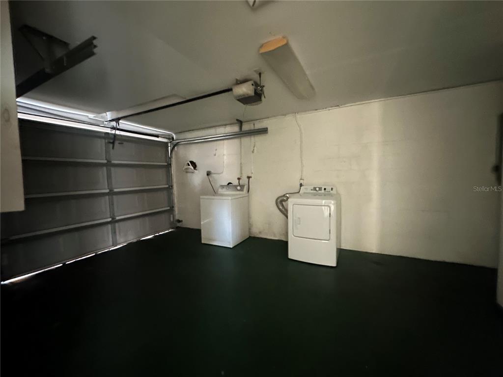 3505 Latimer Street New Port Richey, FL 34652 - Photo 19 of 20 a view of a storage & utility room with a fridge