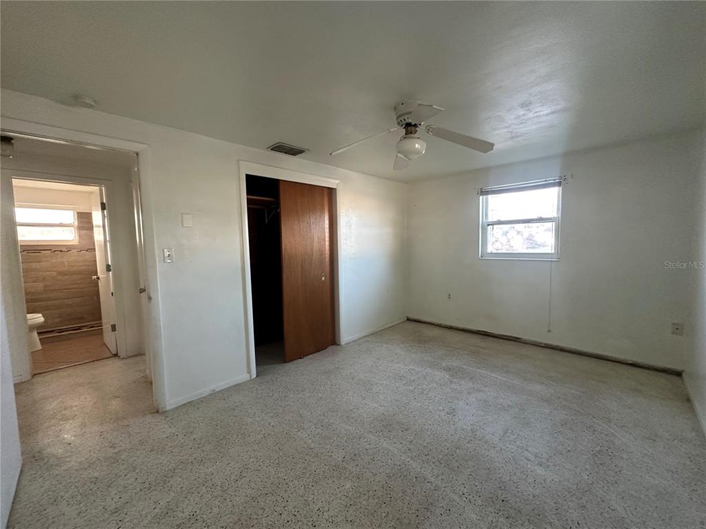 3505 Latimer Street New Port Richey, FL 34652 - Photo 10 of 20 an empty room with windows and closet