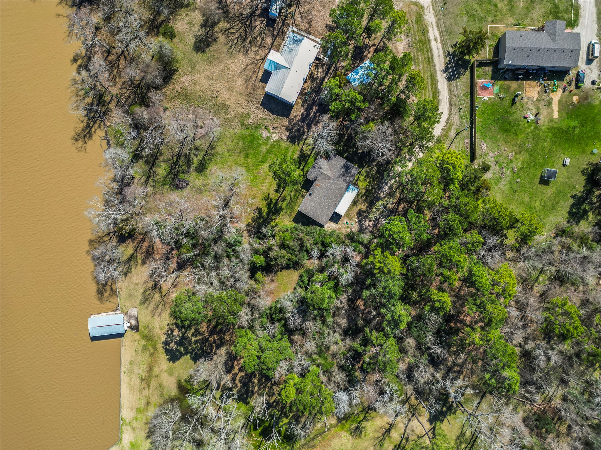 375 Lonesome Dove Trail Trinity, TX 75862 - Photo 36 of 40 an aerial view of residential house with outdoor space and trees all around