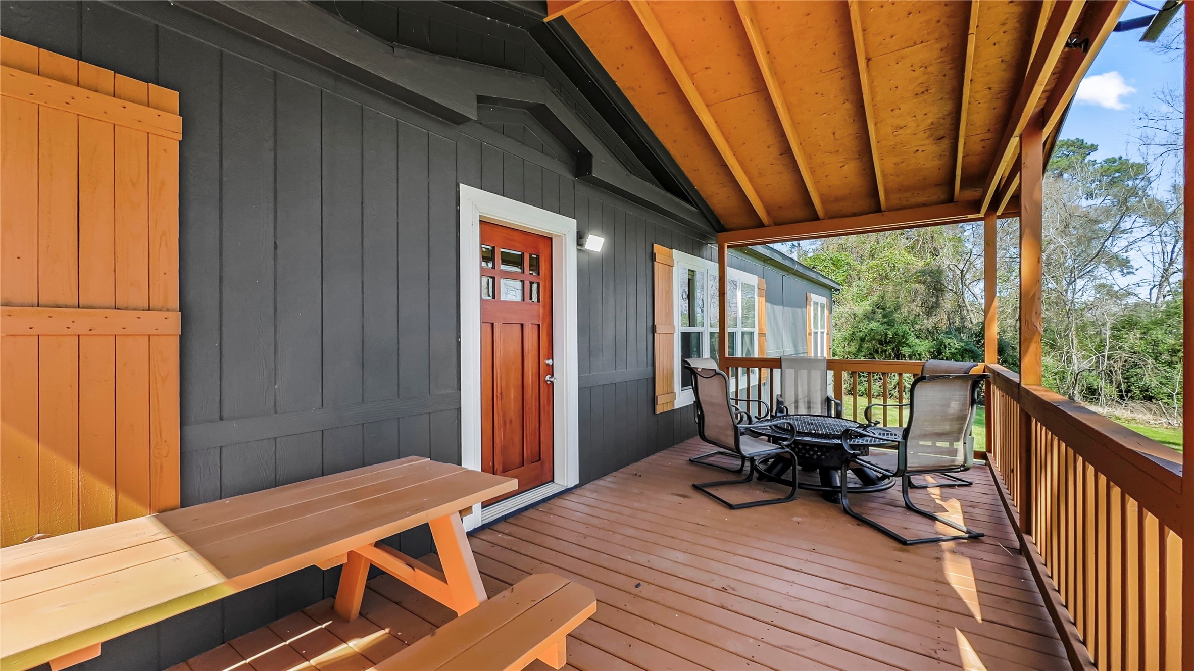 375 Lonesome Dove Trail Trinity, TX 75862 - Photo 5 of 40 a view of balcony with wooden floor and seating space
