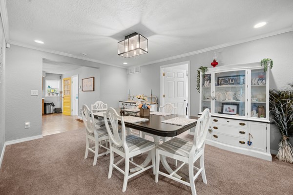 2476 East Washington Road Casey, IL 62420 - Photo 19 of 36 a view of a dining room with furniture and chandelier