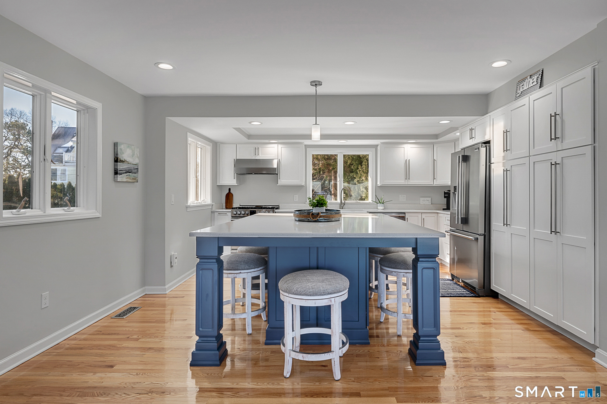 32 Bishops Bay Road East Lyme, CT 06357 - Photo 15 of 40 a kitchen with a table and chairs
