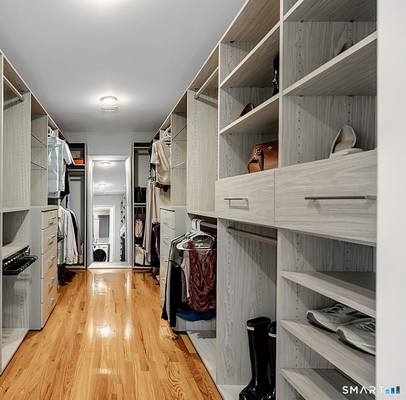32 Bishops Bay Road East Lyme, CT 06357 - Photo 25 of 40 a view of walk in closet with clothes and shoes