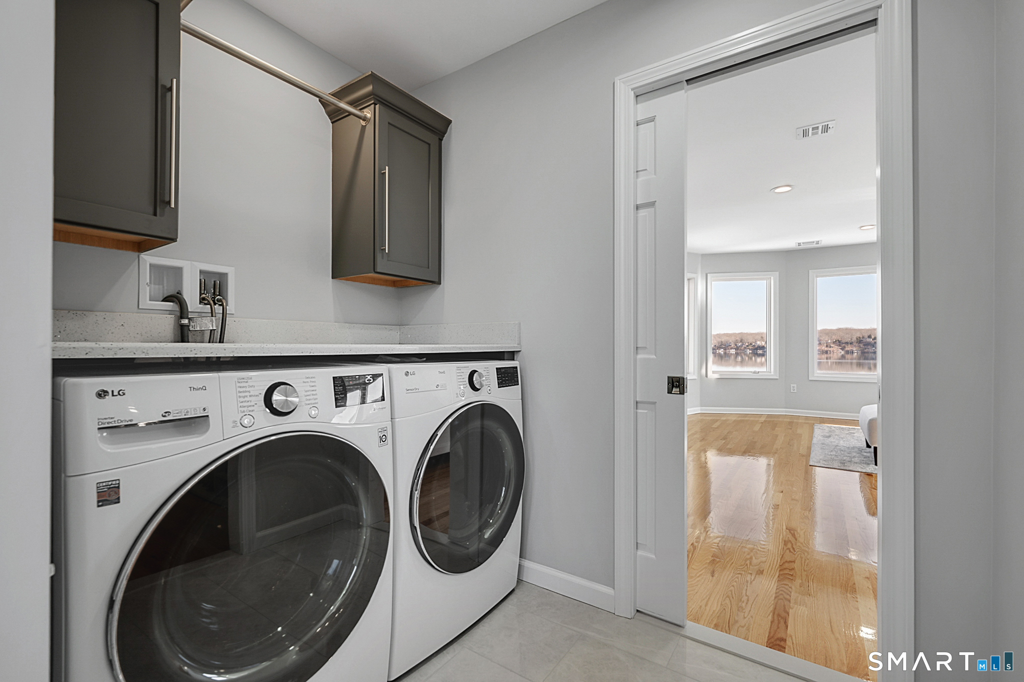 32 Bishops Bay Road East Lyme, CT 06357 - Photo 26 of 40 a view of a hallway with washer and dryer