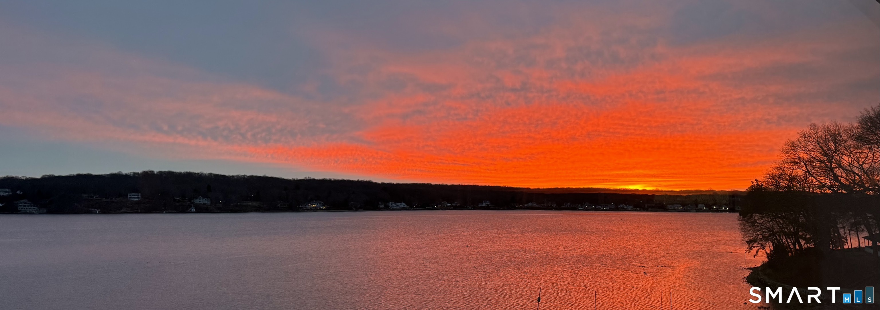 32 Bishops Bay Road East Lyme, CT 06357 - Photo 38 of 40 a view of lake and sunset
