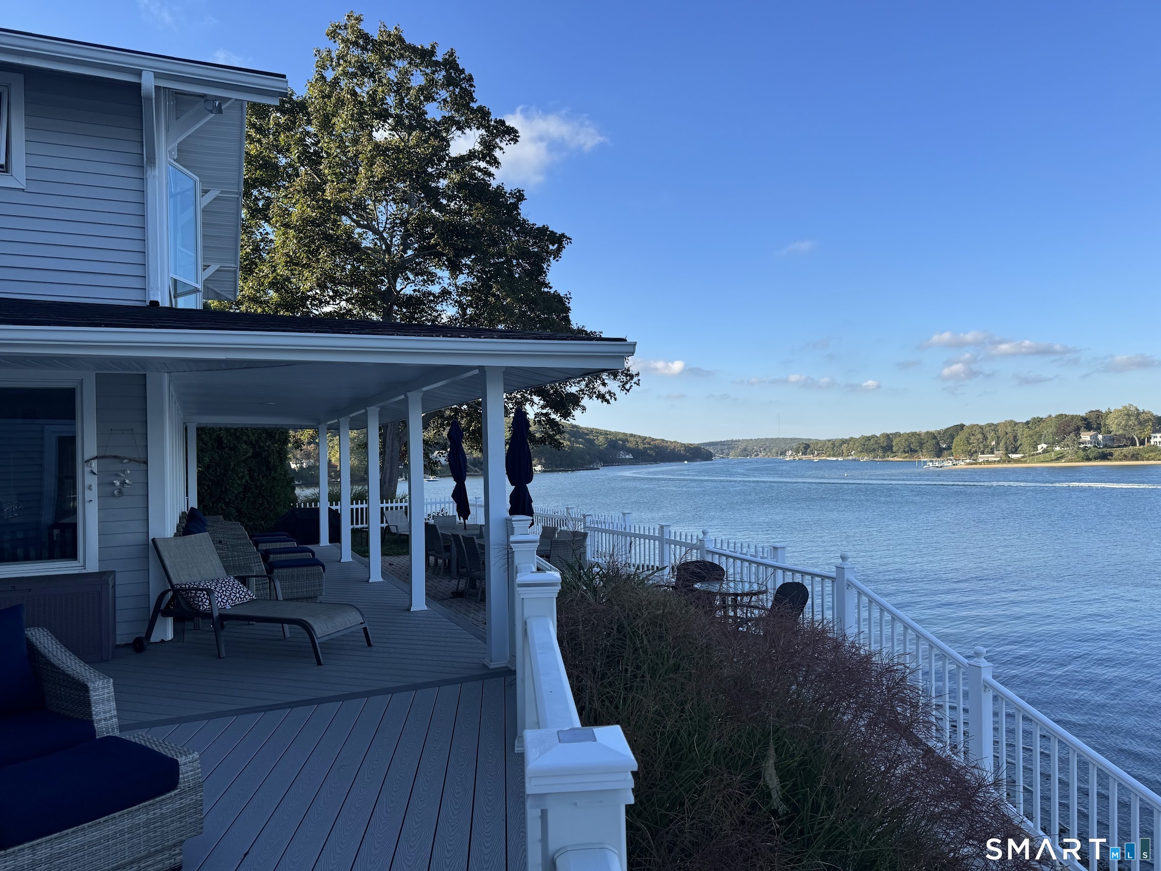 32 Bishops Bay Road East Lyme, CT 06357 - Photo 10 of 40 a view of a balcony with chairs