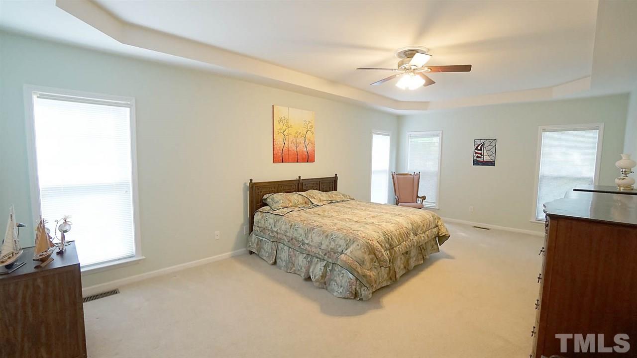 3030 Kilarney Ridge Loop Cary, NC 27511 - Photo 15 of 30 *Gigantic Primary Retreat on Main Level*Trey Ceilings*Fan*Large Bathroom w/Garden Tub, Separate Shower, WC and Walk-in-Closet*