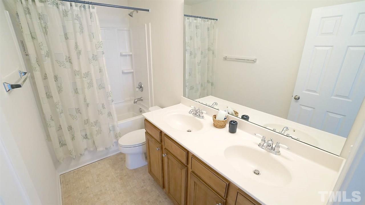 3030 Kilarney Ridge Loop Cary, NC 27511 - Photo 27 of 30 *Upstairs Bathroom w/ Dual Vanities*