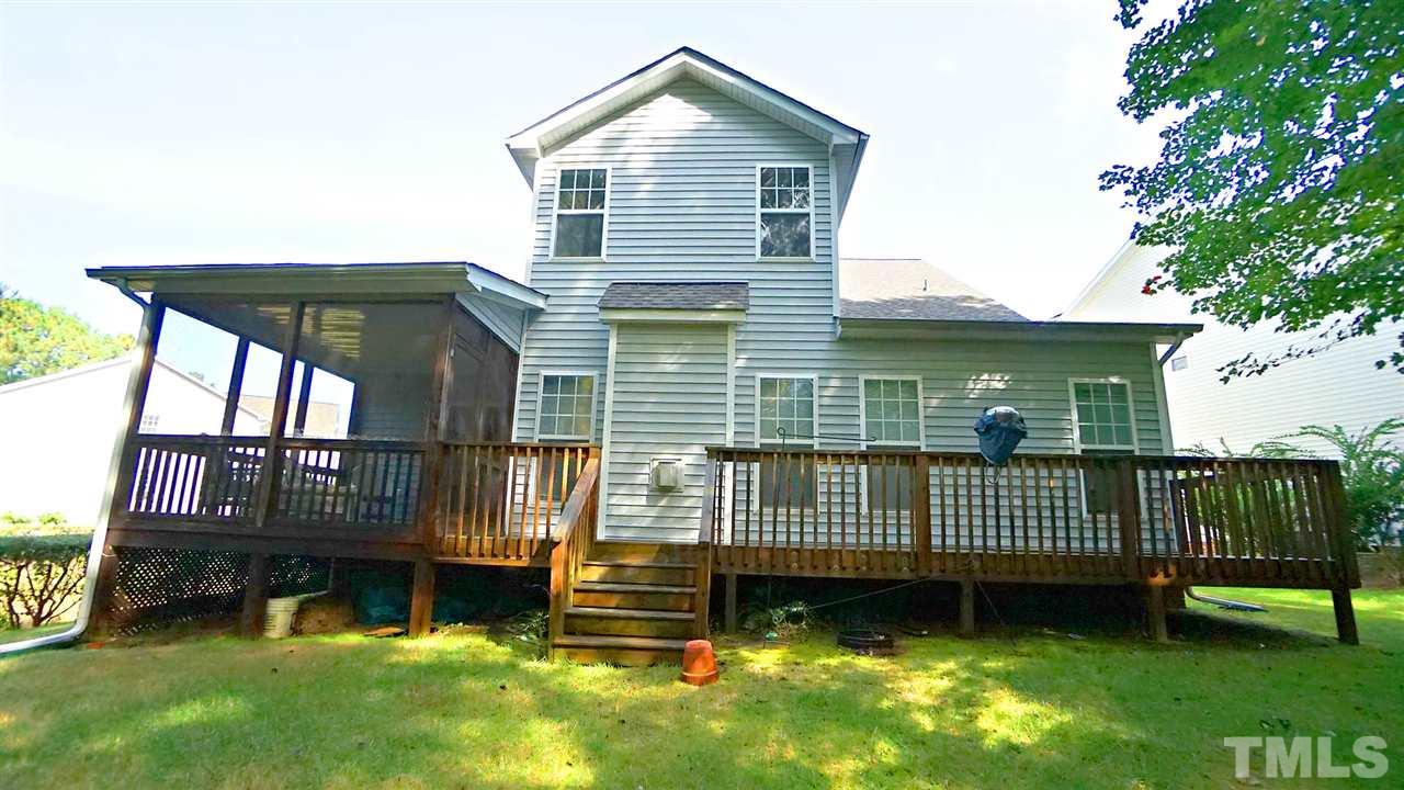 3030 Kilarney Ridge Loop Cary, NC 27511 - Photo 29 of 30 *View of Home from the Backyard Lawn & Natural Area*
