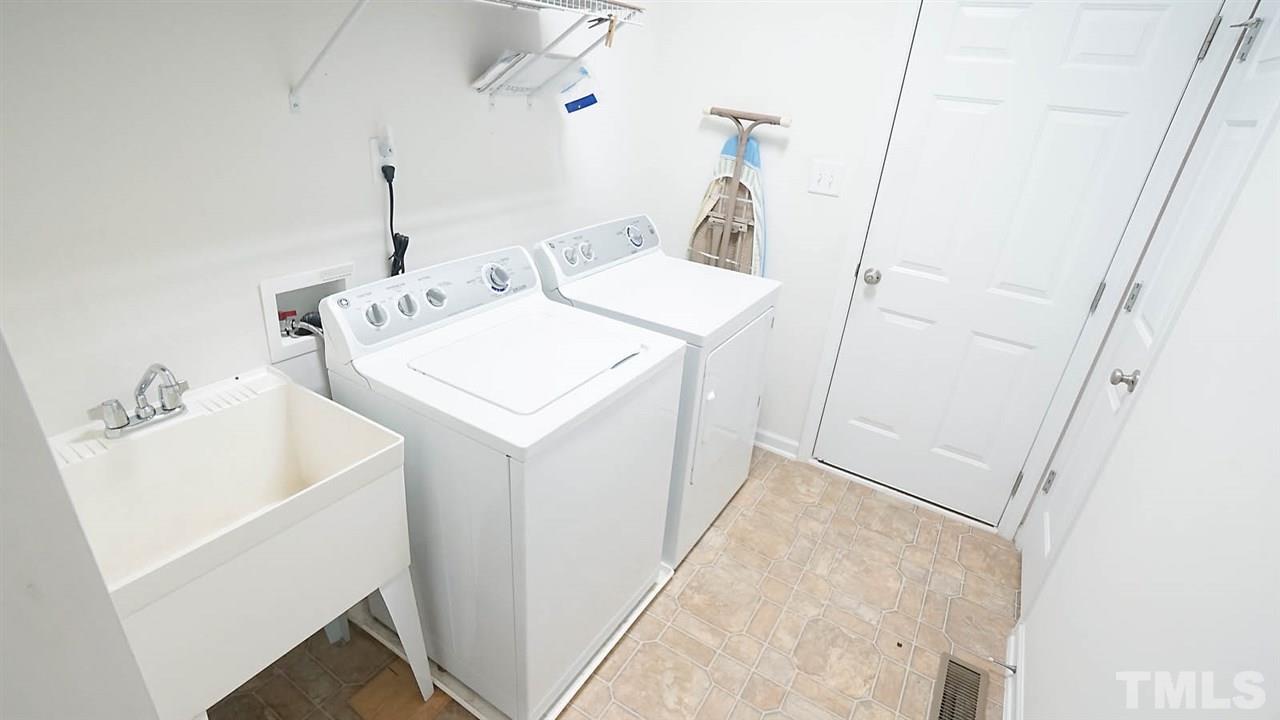 3030 Kilarney Ridge Loop Cary, NC 27511 - Photo 30 of 30 *Laundry Room w/ Sink and Tech Hub*