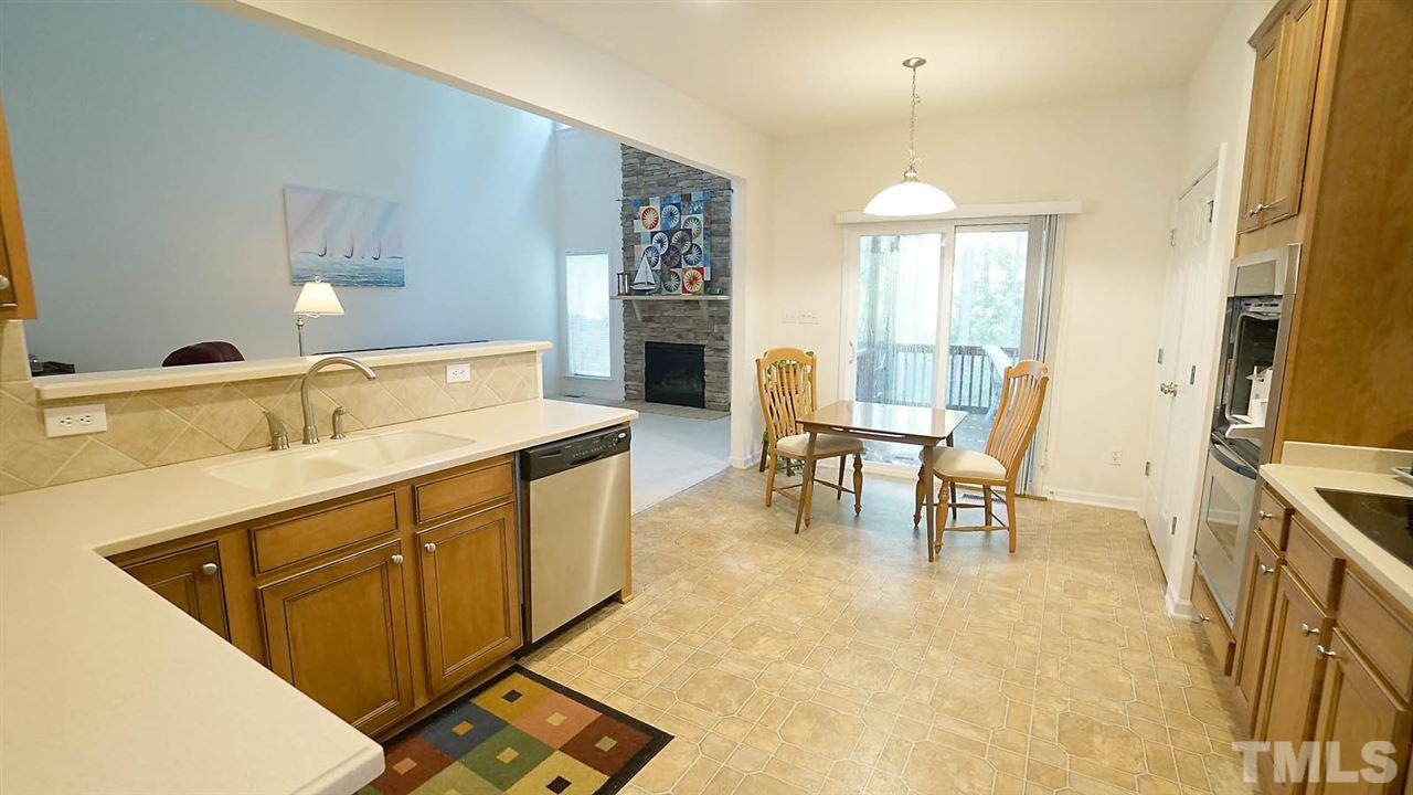 3030 Kilarney Ridge Loop Cary, NC 27511 - Photo 7 of 30 *Spacious Kitchen Overlooks Family Room*