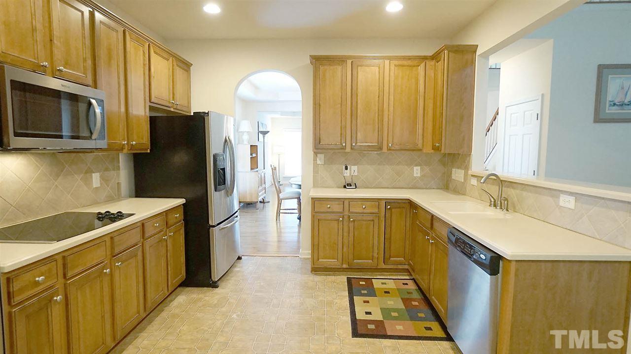 3030 Kilarney Ridge Loop Cary, NC 27511 - Photo 8 of 30 *Beautiful Corian Counters, Tile Backsplash, Smooth Top Stove*Double Oven to be Replaced*