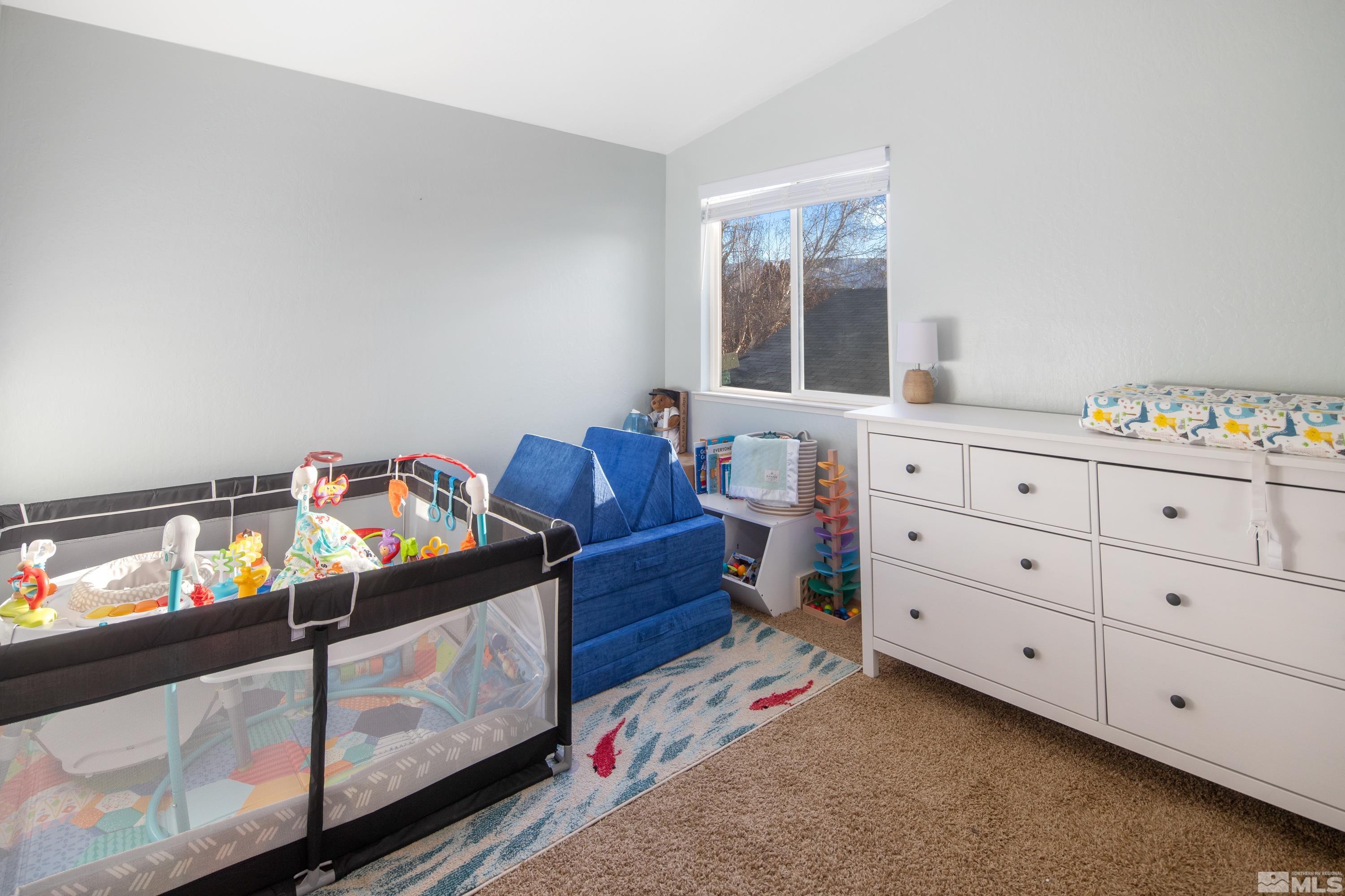 1195 Westlake Road Reno, NV 89523 - Photo 20 of 28 a bedroom with a bed and a window