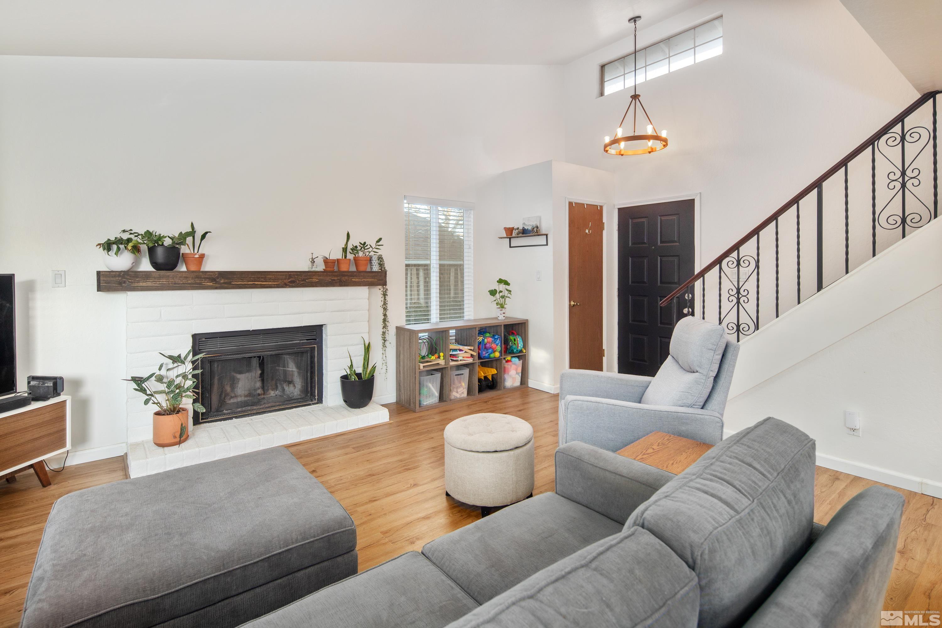 1195 Westlake Road Reno, NV 89523 - Photo 4 of 28 a living room with furniture and a fireplace