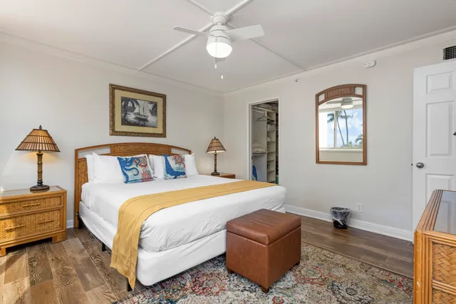 a bedroom with bed and a couch