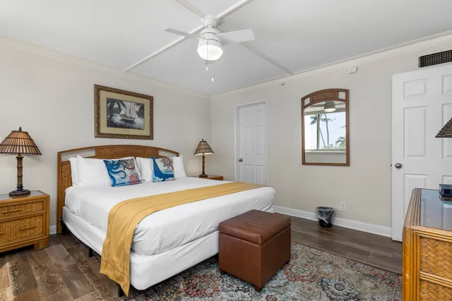 a bedroom with bed and window