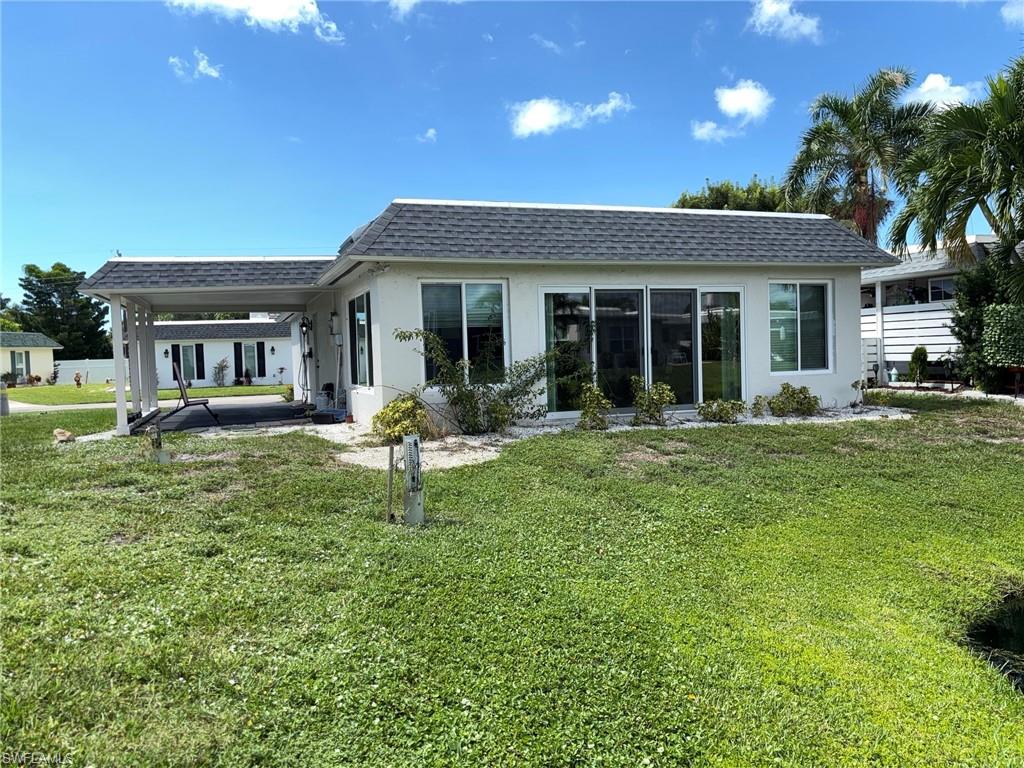 38 Knights Bridge Road, Unit A42 Naples, FL 34112 - Photo 3 of 9 Rear of Home