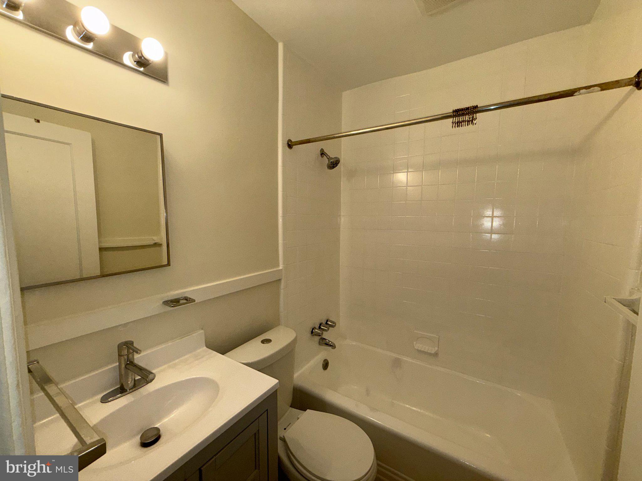 102 O Street Southwest, Unit 1 Washington, DC 20024 - Photo 7 of 18 Modern bathroom with sleek finishes.