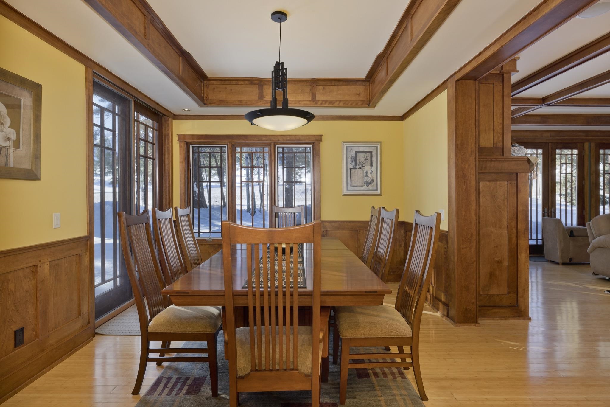 56 Wagon Road Mammoth Lakes, CA 93546 - Photo 10 of 48 a view of a dining room with furniture window and wooden floor