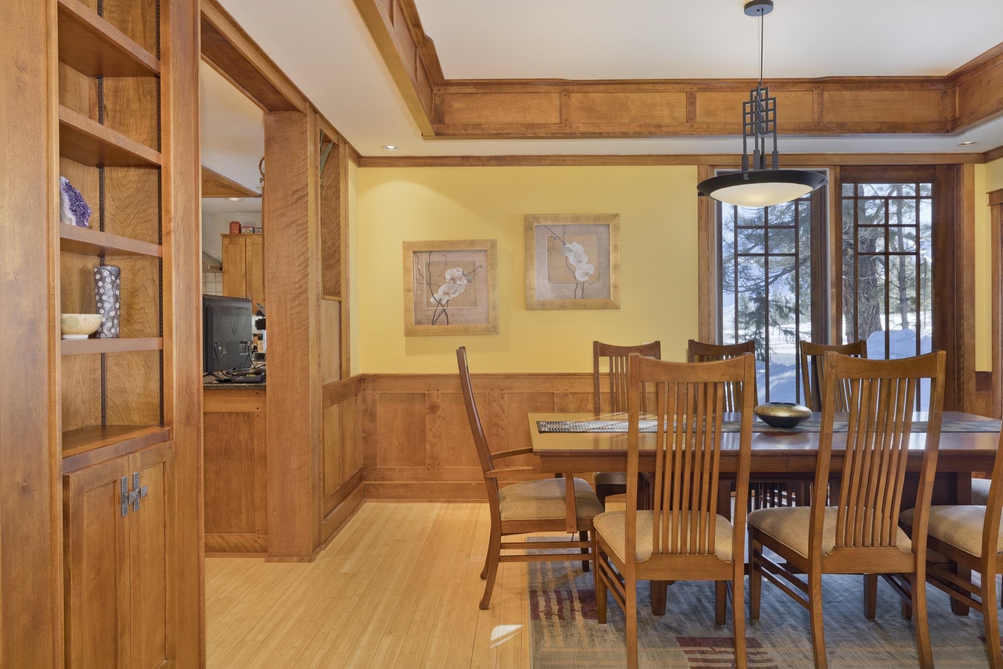 56 Wagon Road Mammoth Lakes, CA 93546 - Photo 15 of 56 Dining area with a wainscoted wall, light wood-style flooring, and ornamental molding