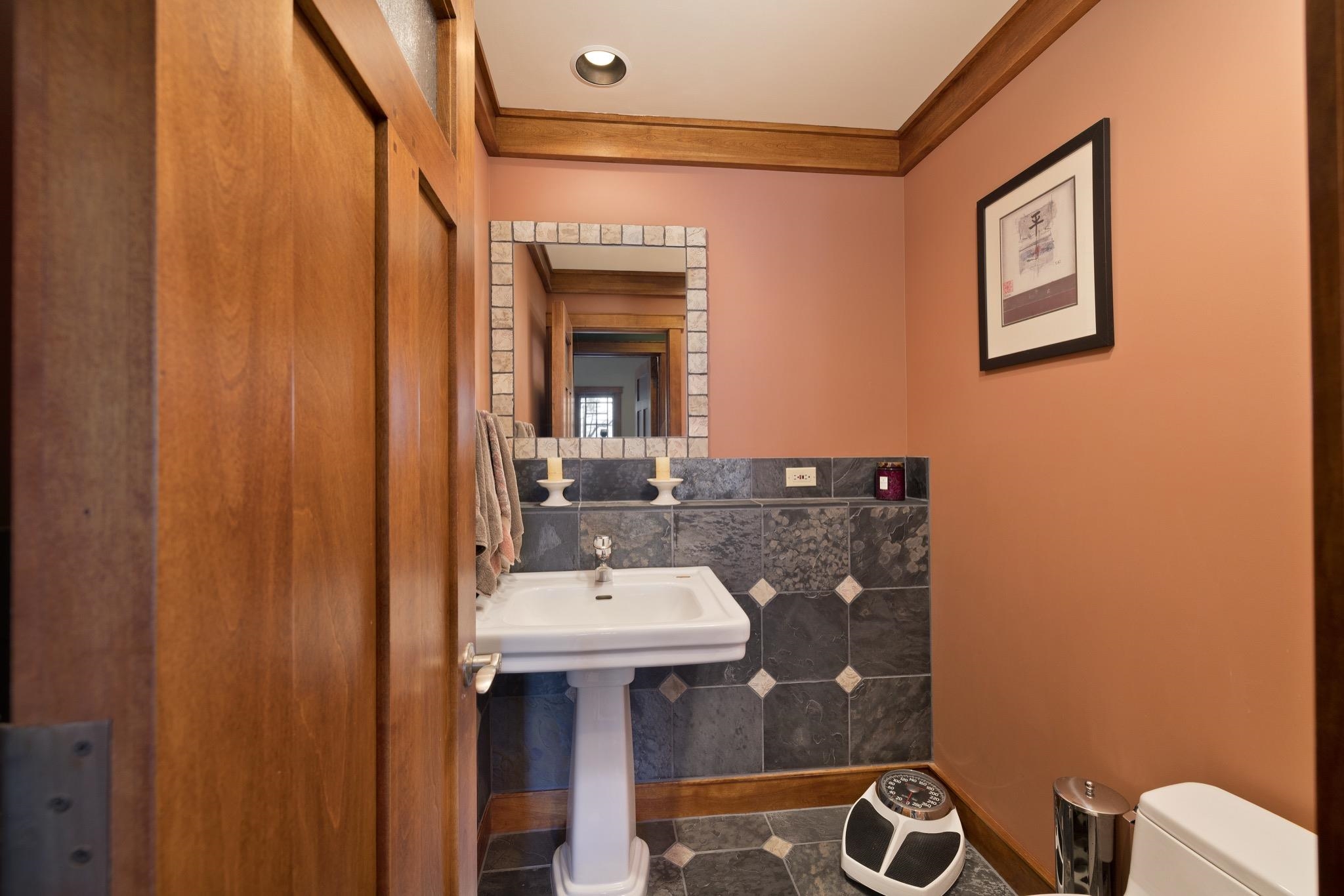 56 Wagon Road Mammoth Lakes, CA 93546 - Photo 16 of 56 Bathroom featuring tile walls, crown molding, and tile patterned floors