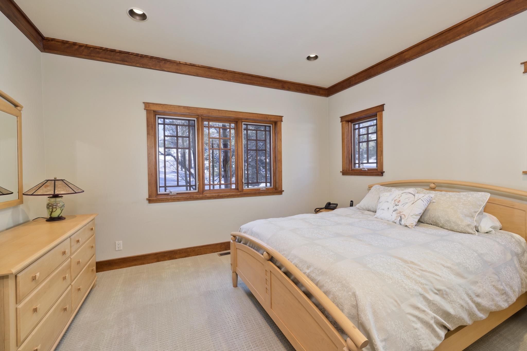 56 Wagon Road Mammoth Lakes, CA 93546 - Photo 17 of 56 Bedroom with light colored carpet, ornamental molding, and recessed lighting