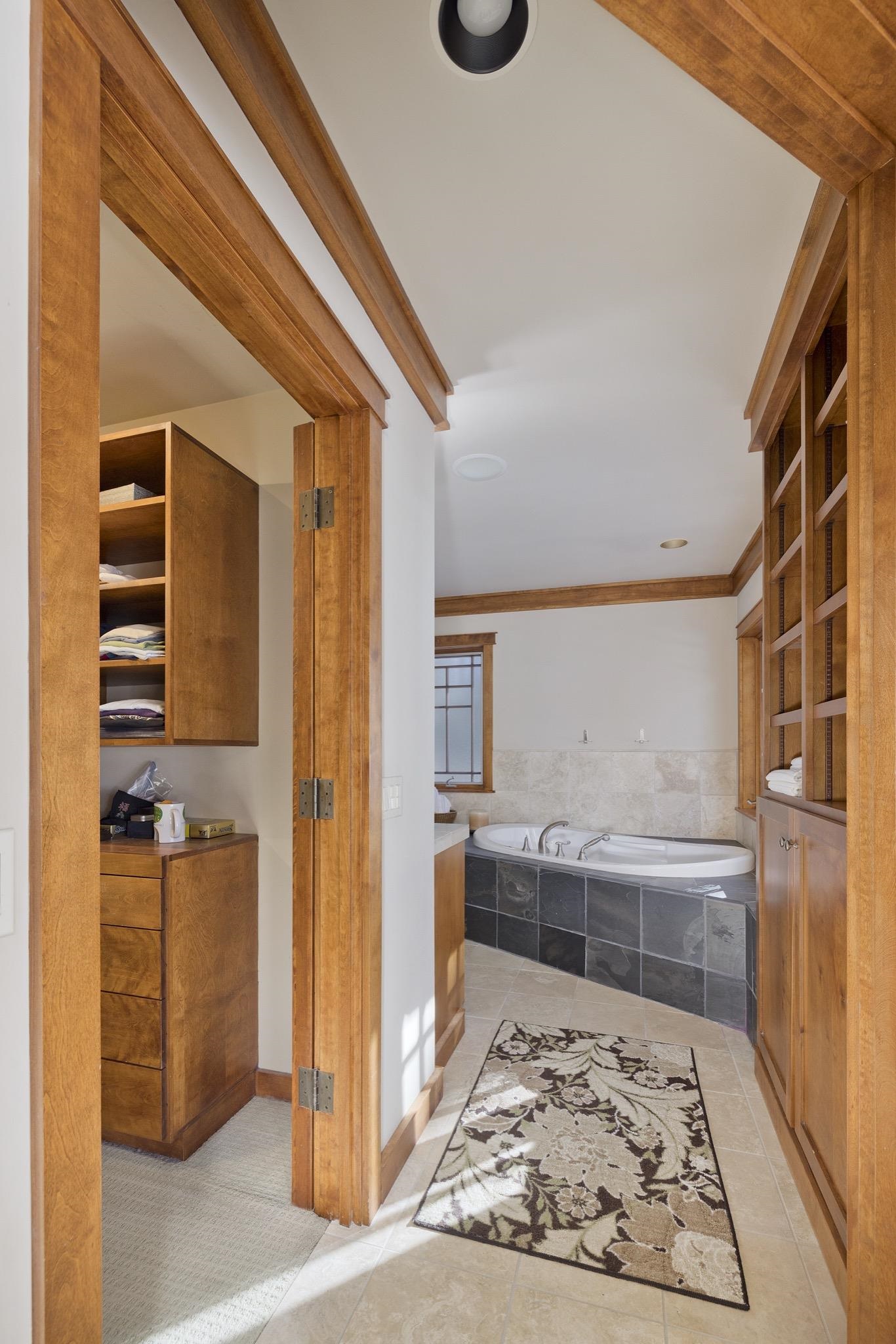 56 Wagon Road Mammoth Lakes, CA 93546 - Photo 29 of 56 Hallway with light tile patterned floors and ornamental molding