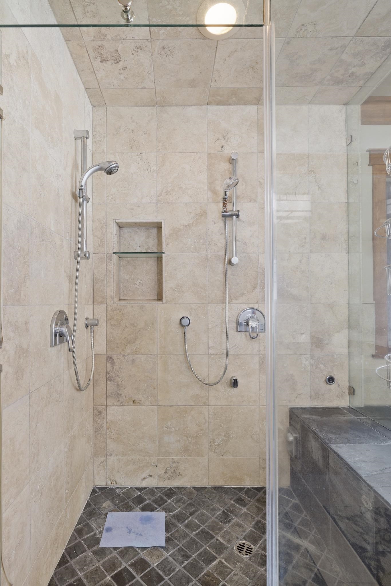 56 Wagon Road Mammoth Lakes, CA 93546 - Photo 28 of 48 a bathroom with a glass shower door