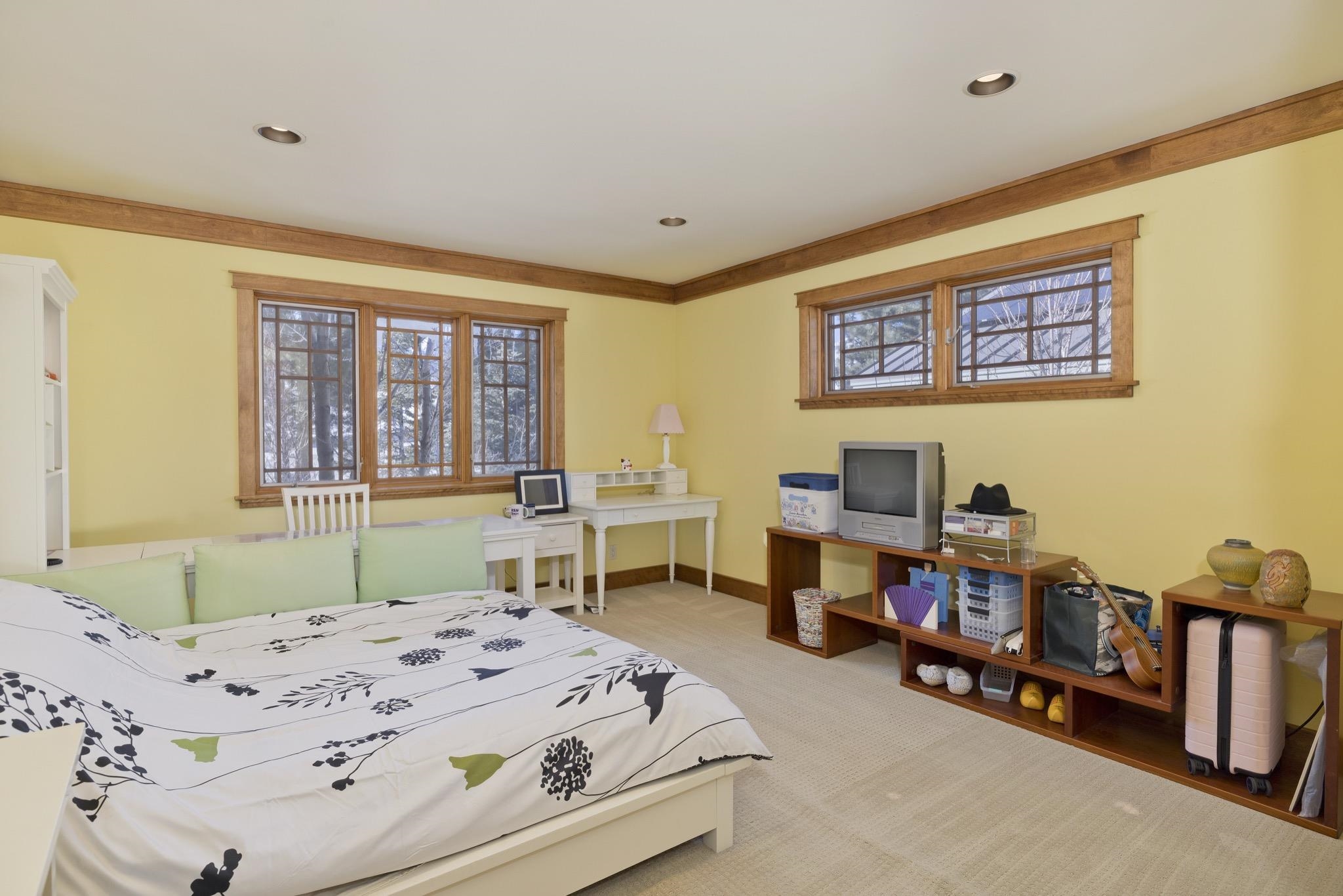 56 Wagon Road Mammoth Lakes, CA 93546 - Photo 33 of 56 Bedroom featuring light colored carpet, crown molding, and recessed lighting