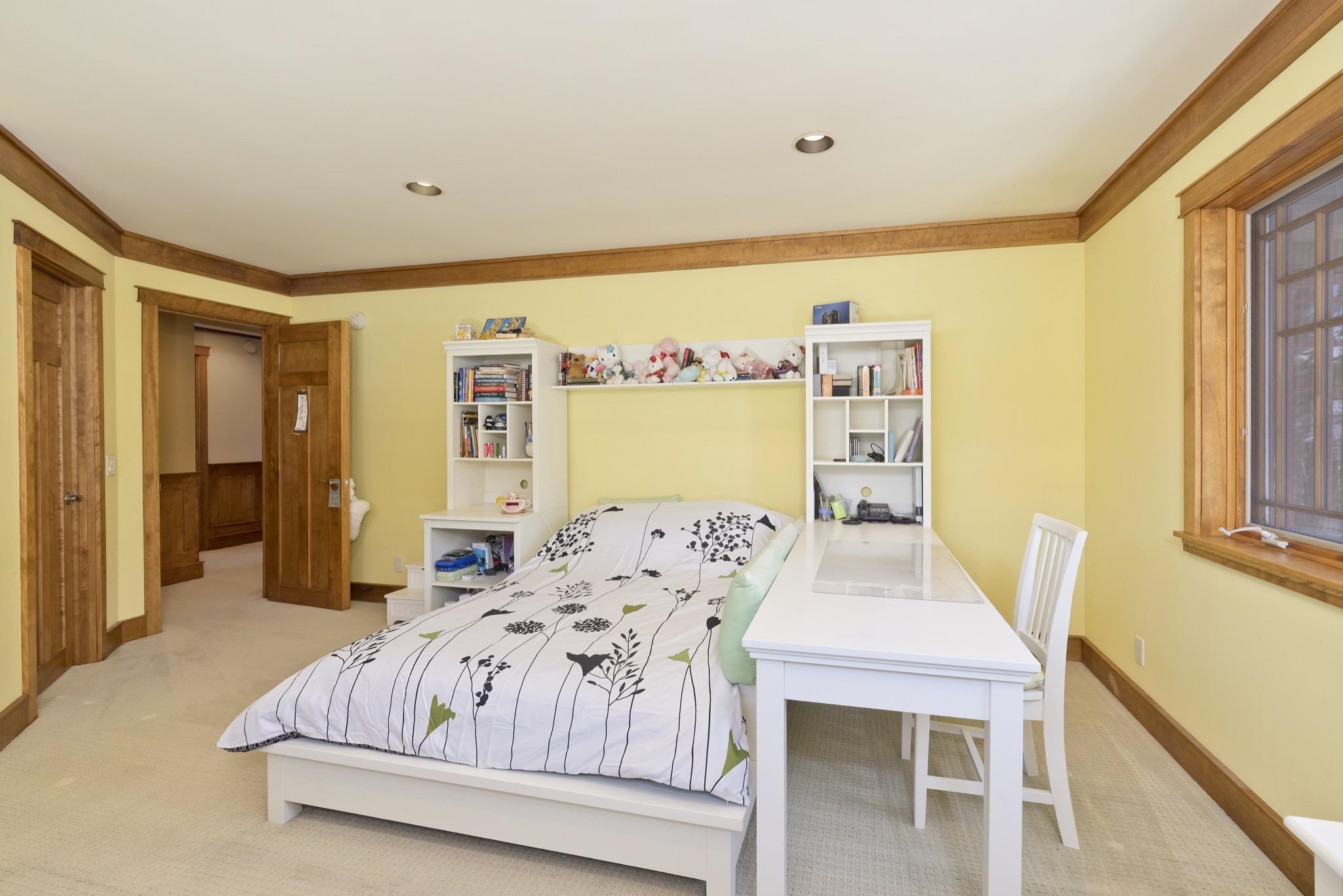 56 Wagon Road Mammoth Lakes, CA 93546 - Photo 30 of 48 a bedroom with a bed and a table in it