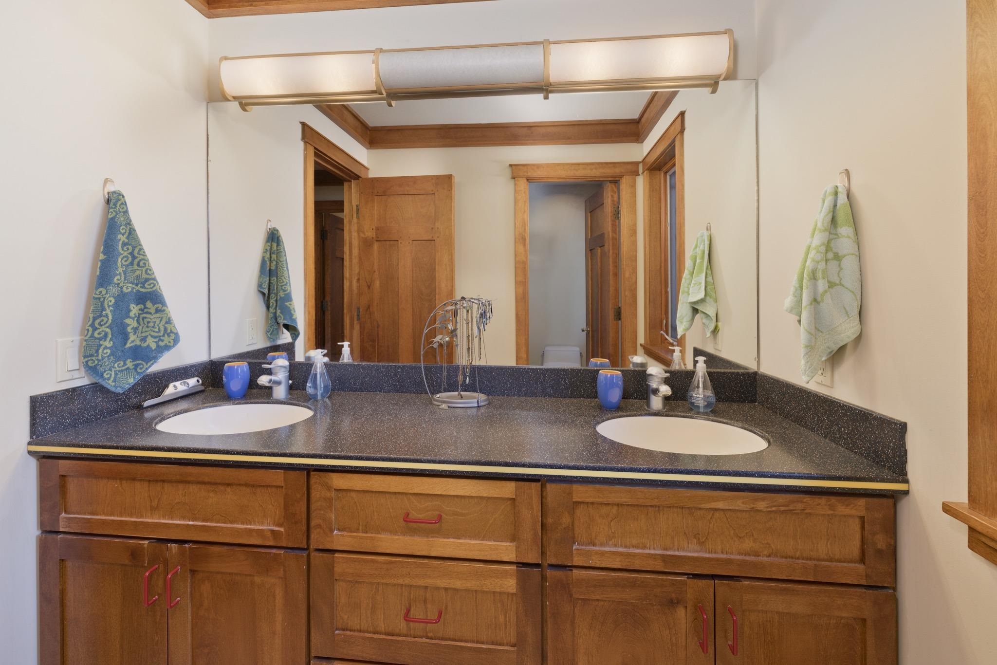 56 Wagon Road Mammoth Lakes, CA 93546 - Photo 31 of 48 a bathroom with a sink and a mirror