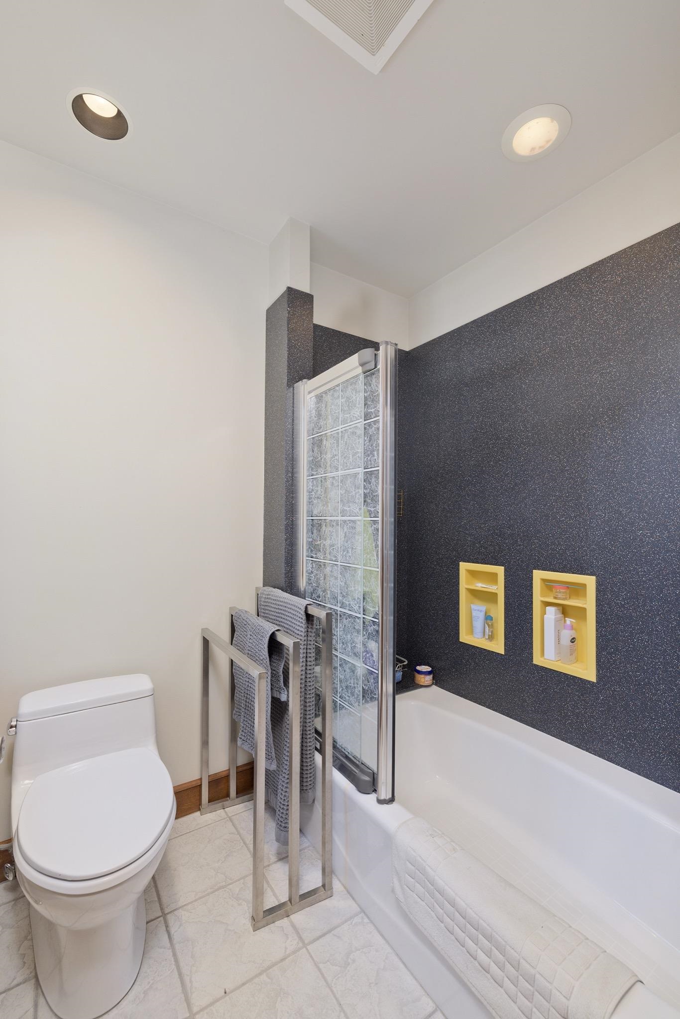 56 Wagon Road Mammoth Lakes, CA 93546 - Photo 36 of 56 Full bath featuring recessed lighting, light marble finish floors, and bath / shower combo with glass door