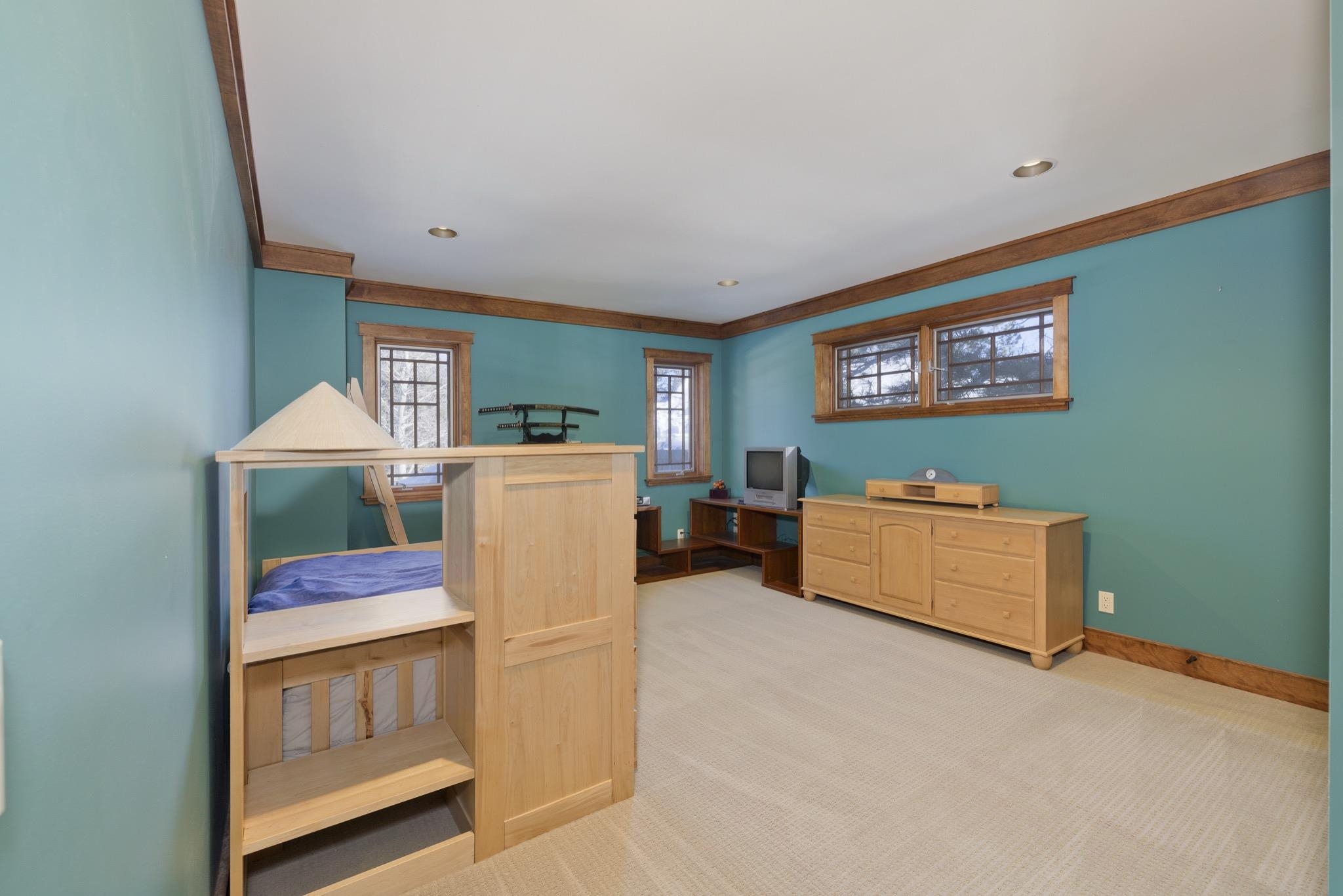 56 Wagon Road Mammoth Lakes, CA 93546 - Photo 38 of 56 Bedroom with light colored carpet, recessed lighting, and ornamental molding