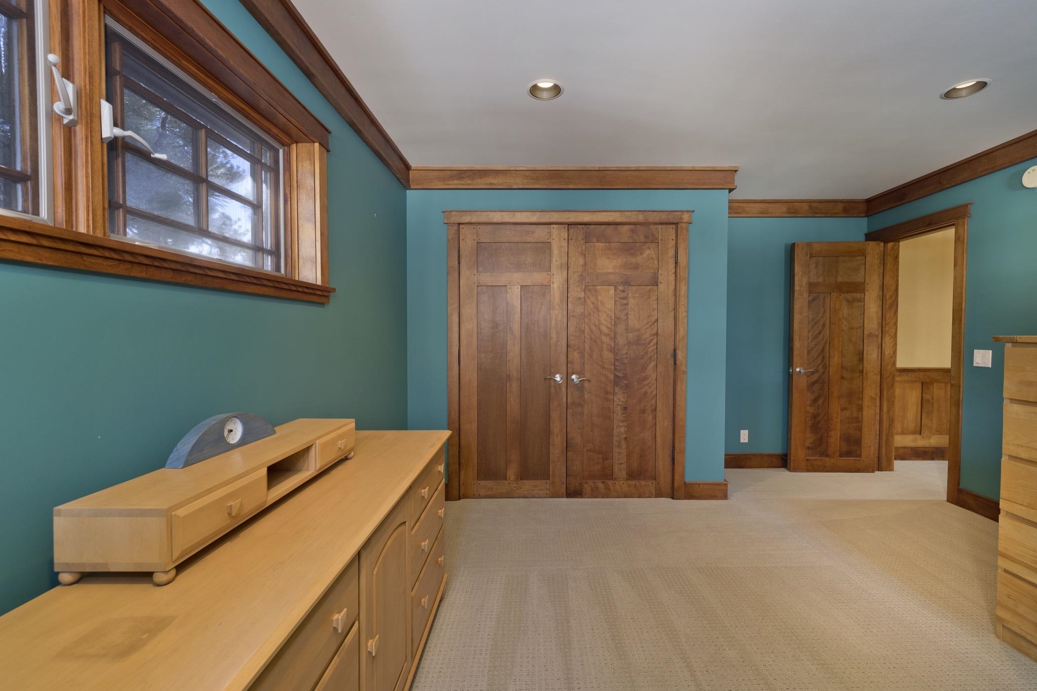 56 Wagon Road Mammoth Lakes, CA 93546 - Photo 39 of 56 Interior space featuring light colored carpet, ornamental molding, and recessed lighting