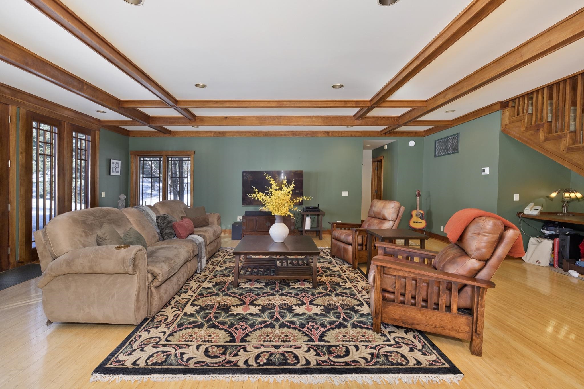 56 Wagon Road Mammoth Lakes, CA 93546 - Photo 40 of 56 Living room with light wood-style floors, stairway, and beam ceiling